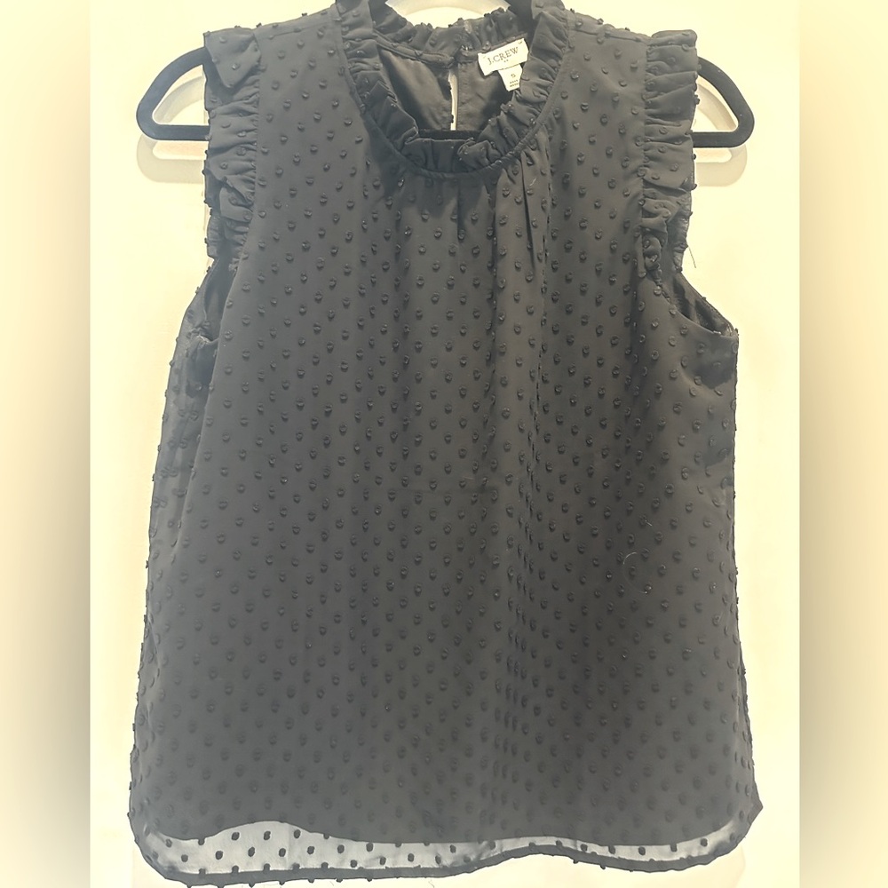 J.Crew black textured sleeveless blouse. Ruffle edges and neck.